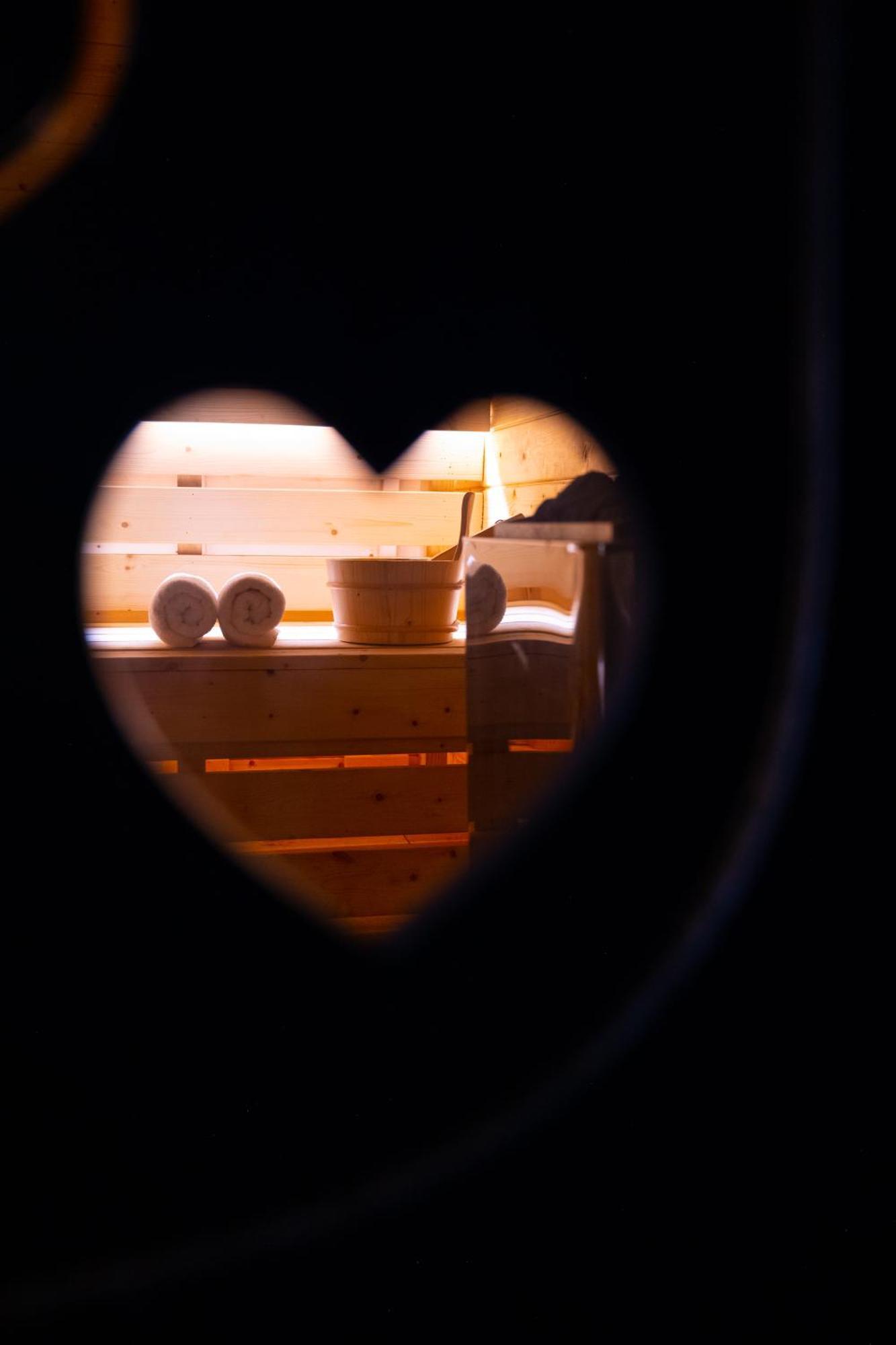 Arka Art Hotel Тирана Экстерьер фото A heart-shaped hole in a sauna door